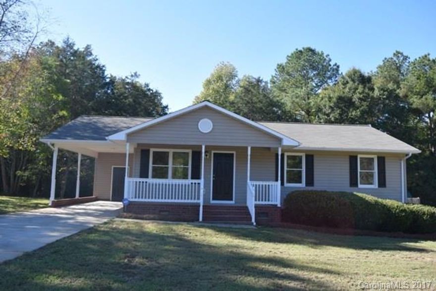 This is a better than new beautiful ranch that has tons of updates! All new carpet, tile & laminate flooring throughout, new stainless appliances, cabinets & counter tops in the kitchen & baths. New light fixtures & ceiling fans, freshly painted interior. Storage closet off the single carport.  Great outdoor space with rocking chair front porch and deck. You won't be able to find this kind of home at this price! Home is on a crawl space, NOT A CONCRETE SLAB! Be the lucky one to call this home!