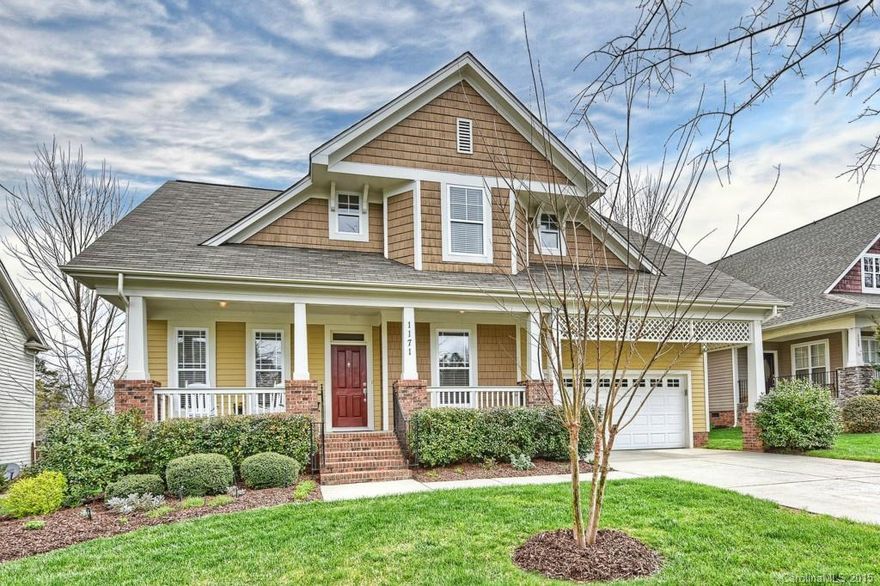 Immaculate craftsman style home on cul-de-sac with a view! Southern Style front porch greets you as you enter home! Beautiful hardwoods thru-out main living area! Vaulted ceiling, fireplace are features of great room opening to kitchen & bkfst area.   Nice natural light makes for bright & airy feel.  Master down suite! 5th Bedroom up could also serve as a bonus! Huge walk-in attic for storage! Lots of closet space! Loaded w/comm. features including Tega Cay Golf Course, pool, club house & lake!