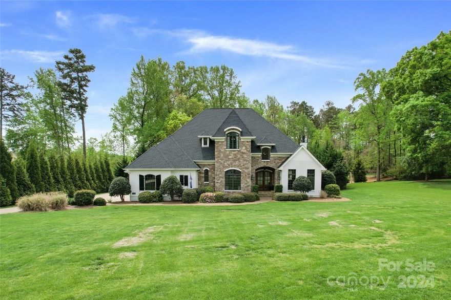 Stunning home with a large level lot, no HOA and a exquisite backyard oasis perfect for hosting the best summer cookouts! This home features wood flooring throughout the main floor with a grand curved staircase in the foyer! To the right of the foyer is a large living room equipped with a wet-bar! To the left is the formal dining room. As you proceed through the main level you enter into the magnificent kitchen with two tone cabinetry, quartz countertops, pot filler, new Jenn Air double oven and microwave. The large family room with a fireplace overlooks the back yard and pool with travertine decking and outdoor kitchen. The primary bedroom is also on the main floor and has large ensuite with walk-in shower, jetted tub, dual vanities, water closet and a large walk-in closet. The main floor is finished out with an office and oversized laundry room. Upstairs are the additional 3 bedrooms, 3 more full baths a loft and a large bonus room.