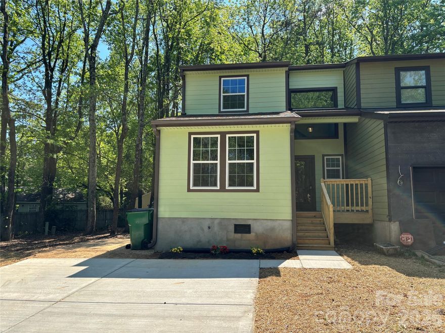 Discover this inviting 4-bedroom, 2-bath home nestled in a quiet cul-de-sac in Charlotte, NC. Featuring vinyl plank flooring throughout, and a brand new kitchen shines with white cabinets, stainless steel appliances. The primary suite offers a private retreat with an attached bathroom. Enjoy your morning coffee or unwind at the end of the day off the back deck or on the front porch, an inviting space to relax year-round. This townhouse has been rebuilt top to bottom and inside out as well.  New roo, hardiplank siding, new front porch and new deck.  Brand new HVAC system and water heater as well.  Conveniently located near E.W.T. Harris Blvd and Albemarle Rd, you’re just minutes from shopping, dining, and more. Don’t miss this move-in-ready gem.