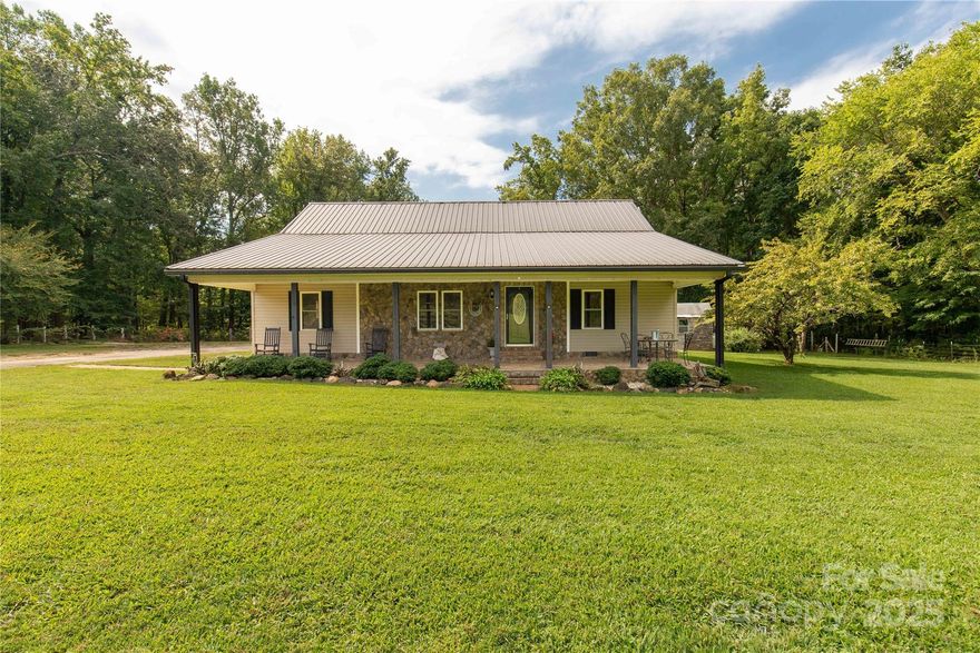 Welcome to this horse lover's dream! This roomy ranch has been thoughtfully designed with an expansive kitchen and dining area, featuring gorgeous flooring throughout. The primary bathroom offers a jetted tub, separate shower, spacious cabinetry, and a walk-in closet.

Outdoors, there is plenty of room to roam. Enjoy the covered porch or step out onto the deck and soak in the hot tub. For entertaining, there's a covered BBQ shed perfect for grilling with guests.

For your horses, the barn includes six stalls, a tack room, a half bath, a wash bay, a horseshoe area, and even a chicken coop. The barn also provides a one-bedroom furnished living quarter with a small kitchen, living area, and full bath. A creek crosses the back of the property, and there are three individual pastures, allowing you to rotate fields for your livestock.

Don't miss this opportunity to enjoy country living at its best in McConnells, SC.