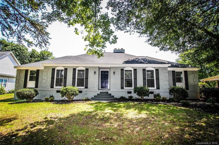 Traditional all brick  home in well established neighborhood. New kitchen with white quartz counters, farm sink, white subway tile, center island, breakfast bar, full stainless steel appliance package and eat in area. Master with his and hers closets + private bath. Beautiful refinished hardwood floors through out, all new lighting, custom tile in baths, fireplaces in front Living Room and Great Room. Large lot and 2 car side load carport.