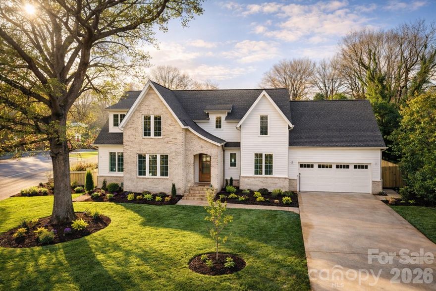 Welcome to this luxury new construction home by Springdale Custom Builders, available for move-in March 2026. Ideally located in Madison Park, this home offers quick access to Park Road Shopping Center, Montford, SouthPark, South End, and Uptown.

Situated in the heart of Madison Park, this exceptional residence offers 3,451 square feet of refined living space, showcasing superior craftsmanship, high-end materials, and elevated designer finishes throughout.

Designed for both everyday living and effortless entertaining, the home features 5 bedrooms, 4 full bathrooms, powder room, and versatile bonus spaces within a modern, highly functional layout. Five-inch, site finished white oak hardwood floors run throughout the home, and every detail reflects Springdale’s signature quality and attention to craftsmanship.

The open-concept living area features a fireplace surrounded by beautiful marble tile, with custom built-ins and picture lighting, flowing seamlessly into the dining area which includes a dry bar. The kitchen is beautifully appointed with an oversized island with seating for six, plus a walk-in pantry for optimal storage and entertaining. The dining room is thoughtfully positioned for gathering. A main-level guest bedroom just off the foyer includes a full bath.

Additional main-level highlights include a covered rear patio with a wrapping staircase leading to the fully fenced backyard and expanded patio. The spacious laundry and mudroom are tucked away with a functional drop zone, custom cabinetry, a deep stainless-steel sink, and overhead storage. An oversized two-car garage features high ceilings for storage racks, and a private office overlooks the yard.

Upstairs, the primary suite is privately situated behind its own foyer and features vaulted ceilings, two spacious walk-in closets with custom shelving, a large dual vanity, soaking tub, and frameless glass-enclosed shower.

The upper level includes three additional bedrooms, one with vaulted ceilings, along with two full bathrooms. Flexible bonus spaces offer endless possibilities for additional bedroom, a second home office, media room, gym, or creative studio.

Thoughtfully designed and impeccably built, this Madison Park residence offers the perfect blend of luxury, comfort, and convenience. Don’t miss the opportunity to own a beautifully crafted Springdale Custom Builders home in one of Charlotte’s most sought-after neighborhoods.

Showings begin 3/21.