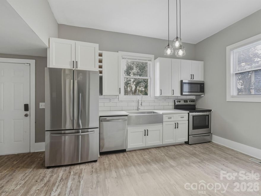 Priced to sell!!! Seller has invested almost 25k into the home since purchasing in 2024 on the crawl space, gutters, roof and hardscaping. This home  may qualify for DPA assistance. Well-updated 3-bedroom, 2.5-bath ranch home offering modern convenience and an ideal location. Recently remodeled by previous owners, this home features LVP flooring, a spacious updated kitchen with stainless steel appliances, and an open, bright layout perfect for everyday living. The primary suite includes a large walk-in closet and an ensuite with dual vanity, while the secondary bedrooms offer generous space and flexibility. Enjoy a large, flat, fully fenced backyard—great for entertaining, relaxing, or pets. The unfinished basement provides excellent storage or potential for future customization. CERTIFIED QUALITY & PEACE OF MIND: This home features a $20,000 engineer-certified structural crawlspace renovation by Crawlspace Medic and a $4,000 HomeCraft Gutter Protection system with a Lifetime Transferable Warranty! Recent exterior maintenance also includes professional roof patch repairs and shingle trimming to ensure the home is move-in ready. Located in the heart of West Charlotte's growth corridor—just minutes from Uptown and Charlotte Douglas International Airport. One of Charlotte's most strategic up-and-coming locations!