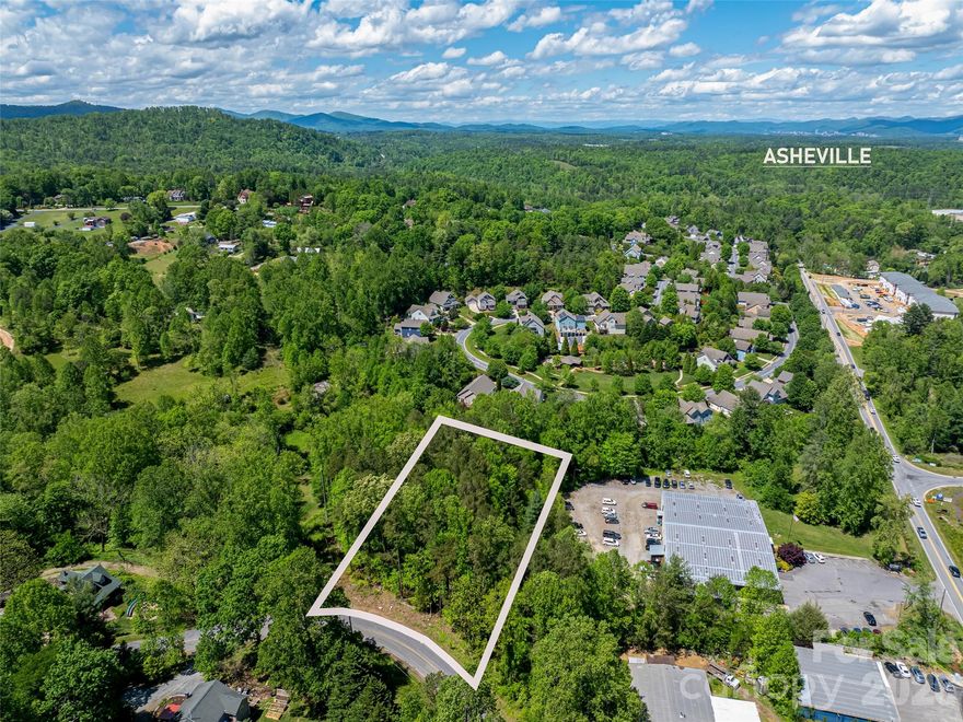 Versatile Opportunity in a Prime South Asheville Location! This 1.5-acre parcel offers exceptional potential for residential, commercial, or mixed-use possibilities along Highway 191—just 10 miles from downtown Asheville. Elevated from Brevard Road, the property provides a blend of visibility and privacy, making it well-suited for a private homesite, family compound, or the potential for multiple residences. Its availability to roadside frontage along a well-traveled corridor creates added appeal for select commercial or live/work concepts. With convenient access to Hendersonville, Brevard, major interstates, and the Blue Ridge Parkway, the location supports both everyday living and business accessibility. The gently sloped acreage offers flexibility in layout and use, whether you're envisioning a primary residence with a guest home, multi-generational living, or a small-scale commercial presence. A 20-foot utility easement to Brevard Road through a neighboring parcel is already in place per plat, enhancing the property's functionality and access. Properties offering this combination of residential comfort, development flexibility, and strategic location are increasingly hard to find in the South Asheville area.