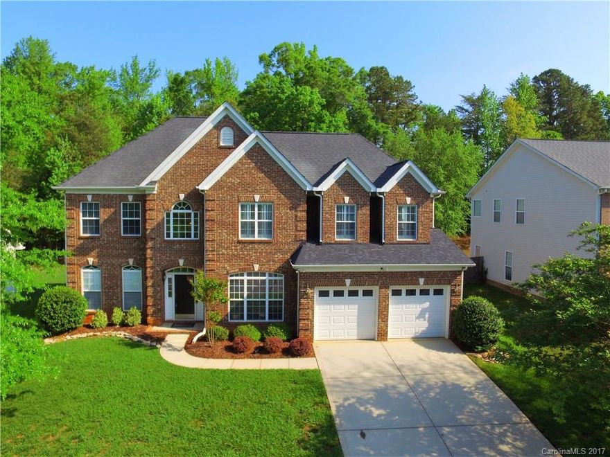 Awesome updated 4 BR 2.5 BA home in the sought after Bethelfield community.  Home features spacious ultra modern kitchen with multi level counters, backsplash and hardwoods/ceramic tile throughout. First floor has formal living and dining rooms and great room wired for sound. Master suite has walk-in closet and updated bath with dual sinks, garden tub and separate shower. Level backyard with patio backs to trees. Minutes from dining/shopping and a short commute to uptown. Must see, won't last!