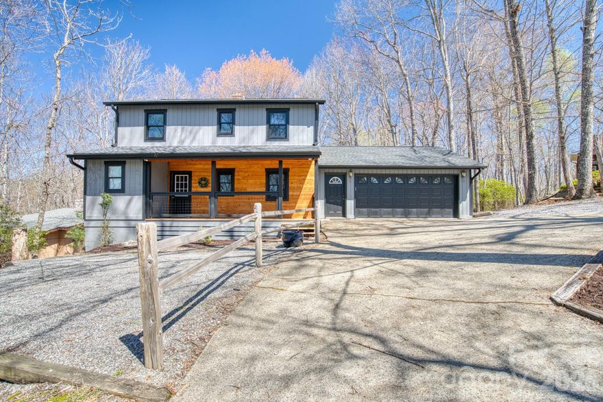 Some homes check boxes. This one checks all of them.

Tucked into one of the most sought-after spots in Connestee Falls, this spacious 4-bedroom, 3.5-bath mountain home has been thoughtfully and recently remodeled and it shows in every room. New flooring throughout, a brand new kitchen with custom soft-close cabinets, and beautiful tongue and groove wood details on the vaulted living room ceiling. The kind of updates that feel intentional, not just cosmetic.

The layout works for real life. Primary bedroom on the main level, two guest bedrooms upstairs, and then downstairs a fully independent suite with its own entrance, kitchenette, living and dining area with a new electric fireplace, and a screened patio. Whether it becomes a space for family, a caregiver, or a short-term rental, it's ready to go.

The location inside the community is a genuine bonus, centrally situated, short drive to the East Fork Gate, and easy access to the clubhouse, Lake Atagahi, and everything Connestee has to offer: 15 miles of hiking trails, four lakes, an 18-hole golf course, fitness center, pool, dining, and gated security.
It's the kind of place that's hard to leave, which means the people who find it tend to stay.
