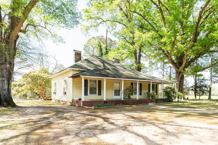 Welcome to 12173 Old Douglass Road in Blackstock SC! This home has so much to offer. This farmhouse is a 3 bedroom 2 full baths home with 2 acres! This home is surrounded by farm land and farm animals. Enjoy the sunshine while sitting on the front covered porch with views of the neighboring pasture. This home has a large shop/detached garage you can use for parking or storage! This home has so many opportunities to make it yours. Home is being sold AS-IS and that is reflected in the price. Schedule your showing on this beautiful farmhouse today!