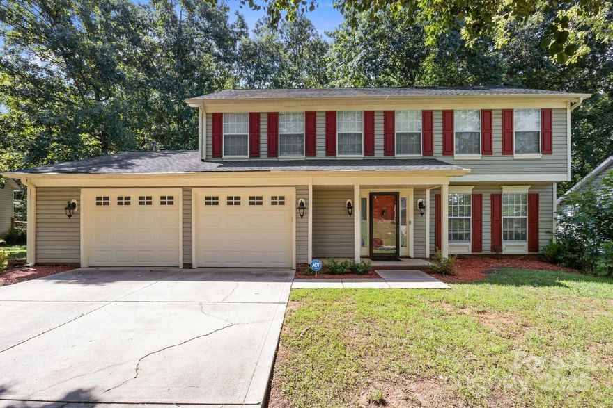 This beautifully updated 4-bed, 2.5-bath home is a true STANDOUT, situated on a quiet cul-de-sac in the desirable Northwoods Community. Featuring a spacious and thoughtfully designed floorplan, the home boasts a completely remodeled dream kitchen with quartz countertops, tile backsplash, DBL oven, SS appliances, professionally painted cabinetry, generous storage, & oversized dining area. The inviting family room offers warmth & charm with a wood-burning fireplace & ceiling fan. Upstairs, the luxurious primary suite features a spa-like bath with DBL vanities, freestanding  tub,  floor-to-ceiling tiled shower, and a walk-in closet. All this on a .31-acre park like setting with loads of backyard space for the whole family & pets. Newly fully fenced with firepit area, & patio for summer barbecuing. Prime location, minutes from shopping, dining, & commuter routes. Enjoy all the amenities Northwoods has to offer, walking trails, sidewalks, a clubhouse, playground, and an Olympic-sized pool.