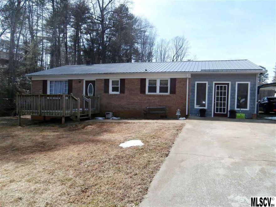 Many updates make this home ideal! Laminate flooring, replacement windows, tile floors, tile countertops and backsplash...the list goes on and on. The NEW master bedroom is spacious with a gas log fireplace and oversized walk in closet. The metal roof has a lifetime warranty and offers low maintenance. There is a detached storage building/shed that measures 27x25 feet with electricity and an additional 12x12 utility shed. Last house on a dead end street with very little traffic.