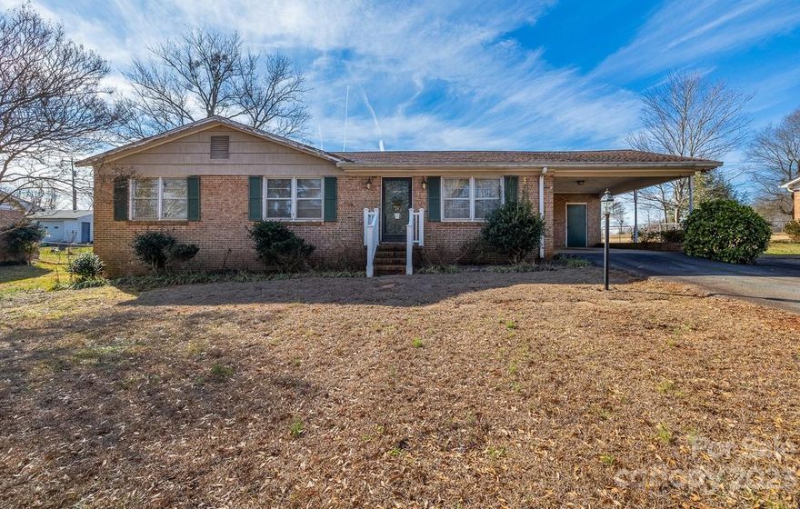Nestled in an established neighborhood just minutes away from the heart of Spartanburg, this charming brick ranch home invites you to make it your own. The well-designed layout features 3-bedrooms and 2- bath providing ample space for a growing family or accommodating guests. Step inside, and you'll be greeted by the inviting ambiance of real hardwood flooring and a wood burning fireplace to build a crackling fire on those chilly nights. Embrace the large flat yard for your furry friends or neighborhood gatherings and relish the convenience of being in a great location with NO HOA. Fireplace is for aesthetic purpose only and being sold as is.
