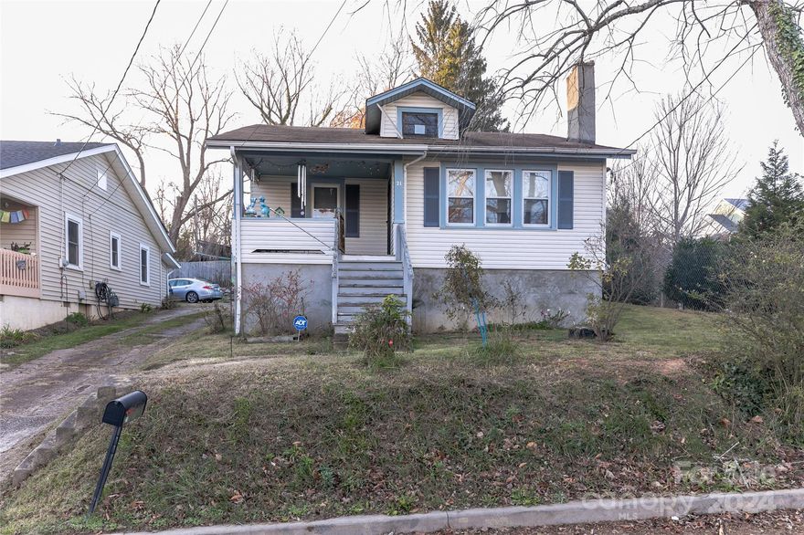 Charming 2-bedroom, 1-bathroom single-family home located in a prime Asheville spot near the scenic French Broad River. This cozy residence features hardwood floors throughout, with linoleum in the kitchen and bathroom for easy maintenance. The home is equipped with a gas stove, refrigerator, microwave, washer, and dryer, all in working condition. Enjoy year-round comfort with gas heating and central cooling.
The unfinished basement provides additional storage or potential for customization, while the shared driveway leads to a dedicated parking spot at the back. The property boasts a solid construction of wood with a brick foundation smoothed with cement and a durable shingle roof. Laundry is conveniently located in the kitchen
This home is an excellent opportunity for those looking to enjoy the natural beauty and vibrant community of Asheville. Don’t miss the chance to make it yours!   Please call during regular business hours to schedule your showing, no weekends.