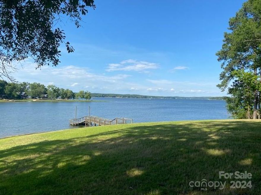Escape to your own private oasis!  This beautiful waterfront property offers breathtaking views of the lake, a private dock, and plenty of outdoor space.  The view of the sunrise is spectacular!  The home is situated on a .71 acre lot and has 134 +/- feet of water frontage.  Located just minutes from the interstate, offering a convenient commute to the Columbia or Charlotte Metro area.