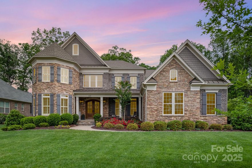 Welcome to 320 Eden Hollow Lane, Private, Luxurious, and Built for Entertaining. Nestled on a spacious, wooded, and fenced lot, this stunning home offers the perfect blend of privacy, luxury, and convenience. Step inside to discover a grand staircase, chef’s kitchen with premium Wolf SS appliances, a Sub-Zero refrigerator, custom cabinetry, and a dedicated high-volume ice maker. The open layout flows seamlessly into a versatile living space, pre-wired for surround sound in the family room, bonus room, and outdoor living area, making this home perfect for gatherings of all sizes. Step outside to your personal oasis, complete with an outdoor kitchen, gas wood fire pit, and lush landscaping supported by a full irrigation system. Homes like this don’t come along often - schedule a tour today to experience the lifestyle you’ve been dreaming of!