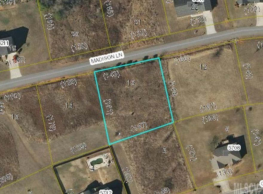 Nice lot has a slight rise up from road. 1400 sqft is minimum to build exclusive of garage and porches. Public water is available. Lot has been perked.