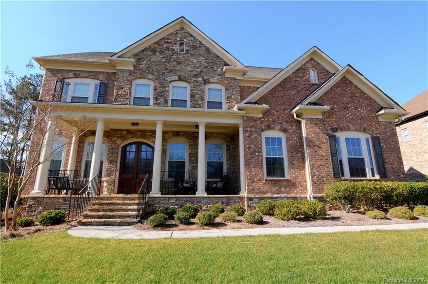 Gorgeous home in Bridgemill on a private wooded lot with lagoon-like pool complete with sun ledge, stacked stone waterfall, and gas fire bowls. Spacious kitchen with huge island and granite counter tops. Plenty of room to grow with an unfinished 3rd floor boasting over 1000 sq ft. Welcome Home!
TV & SURROUNDING CABINET IN ROOM OFF KITCHEN DO NOT CONVEY.  
TV bracket will convey and custom made bar can remain