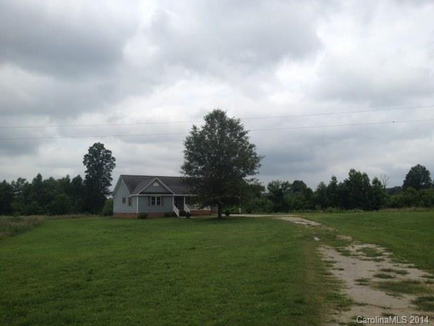 Newer built home with Generous 6 plus acres. Home features Open floor plan with Laminate Flooring in Great Room and 1 of the Bedroom. Vaulted Ceilings in Great Room. Separate Laundry Room. Walk in Closet in Master Bedroom. Enclosed Rear porch for added Living or Storage Space. 2 car Attached Carport with Storage room.
Property Sold As-Is. Equal Housing Opportunity