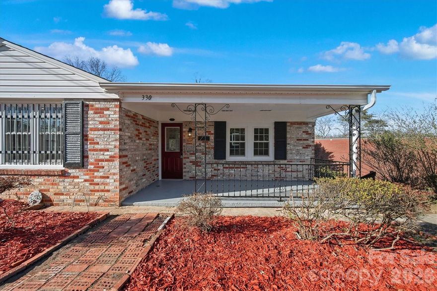 Welcome to 330 Harrington Street in Lenoir—a beautifully renovated brick ranch offering classic charm and modern comfort. This move-in ready home features 3 bedrooms and 1 updated bath, making it the perfect option for first-time buyers, downsizers, or anyone looking for low-maintenance living.

Inside, you’ll find fresh updates throughout, including updated flooring and paint, creating a bright and inviting atmosphere. The renovated kitchen offers modern finishes, ample cabinetry, and great workspace for everyday cooking and entertaining. The updated bath features clean, contemporary touches.

One of the standout features of this home is the large sunroom at the back—an ideal space for morning coffee, relaxing with a book, or entertaining guests year-round. The full basement provides abundant storage, workshop space, or potential for additional finished square footage.

The timeless brick exterior adds durability and curb appeal, while the yard offers room to enjoy the outdoors. Conveniently located near shopping, dining, and local amenities, this updated ranch is ready for you to move right in. Don’t miss your opportunity to own this charming home in Lenoir!