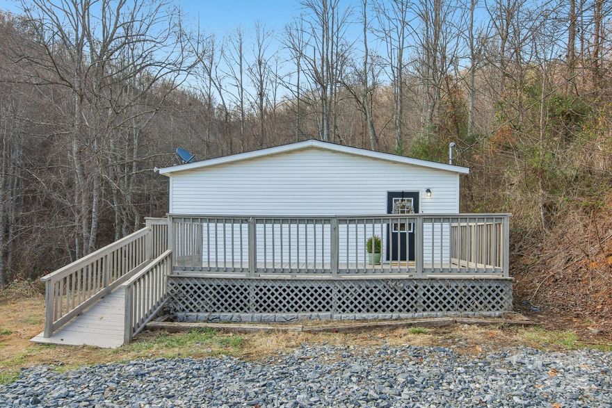 Bring your buyers to this charming, move-in ready home! Newly remodeled with brand new appliances, granite countertops, faucets, flooring and carpet - located in picturesque Mars Hill- only 30 min from Asheville and 25 min from Hatley Point and Scenic Wolf Mountain Ski Resorts! This home offers one-level living and features a spacious open floor plan with 3 bedrooms and 2 full baths. Tucked away just minutes from I26 and HWY 19, you'll find quiet and peace as you take in your mountain views and listen to the sounds of nature. Don't miss out on this little mountain gem! Please note: house used to have a different address (45 Wooded Mountain Trail) that still shows up on the some of the listings - correct address is 205 Sleepy Hollow Dr. Mars Hill, NC 28754