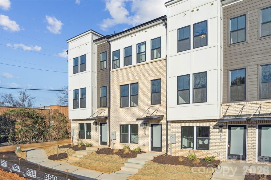 Brand NEW Construction!  Water and sewer costs included in rent.  Located approx. 3 miles from South Park Mall. Welcome to Magnolia Pines, a high end Townhouse community located in South Charlotte less than 1 mile from Costco and within walking distance to Tyvola station. Enjoy exclusive living with this small 24 unit complex. Not your typical apartment complex, peppered throughout the city. This stunning 2-bedroom, 2.5-bathroom apartment offers a luxurious living experience. The primary bedroom features an ensuite bathroom with a tile shower, providing a private oasis. The apartment boasts LVP floors throughout, including the 4th floor bonus room, which provides access to a breathtaking rooftop terrace. The kitchen and bathrooms are fitted with 36" base cabinets, while the kitchen also features a tile backsplash, a kitchen island with a microwave, and luxury quartz countertops. The kitchen's 42" upper cabinets with crown molding and stainless steel appliances, including a 30' electric range and counter depth refrigerator, add a touch of elegance. The living room and all bedrooms are equipped with ceiling fans for your comfort. The apartment also includes a stackable washer and dryer for your convenience. The 2-panel interior doors with square tops and 9ft ceilings on the main level add to the apartment's modern aesthetic. Park 2 cars or have extra storage with the tandem 2 car garage. Water and Sewer included in rent.