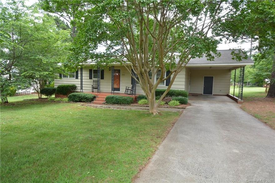 Remodeled and ready for you to enjoy! Spacious kitchen opens into great room with bar stool area. Full bath beautifully remodeled in 2016, with wainscoting, tile floor, & double sink vanity. HVAC & ductwork new in 2014. Newer light fixtures, faucets, & fans throughout. Great storage in this house! Third bedroom currently used as formal dining room. Hardwood floors through great room, hallway, & all bedrooms. Top it off with a large, 0.4 acre flat lot with storage building. This is it!