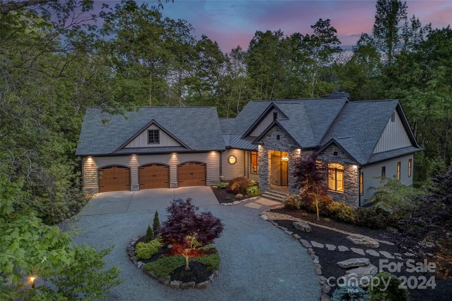 Exquisite custom home located in prestigious Chasewood community.From the moment you enter the driveway you know this is an exceptional home.As you enter the foyer you're greeted by high ceilings and custom trim leading to the great room and layout that provides one level living.The great room boasts vaulted ceilings, stone fireplace, and gourmet kitchen with custom cabinetry constructed by a master carpenter.It's the attention to detail that really sets this home apart.From the cozy enclosed deck with winter views of the sunrise, three-car garage, wired with electric vehicle auto charging, the extra perks are vast. While still on the main level the large covered back porch provides tranquility and room for entertainment under the canopy of the forest.Elevated high enough for cool summer breezes and equipped with anther wood burning fireplace for the perfect mountain ambiance.Guests will relish the spacious lower level with 2 additional beds/baths and living. Must see the virtual tour!