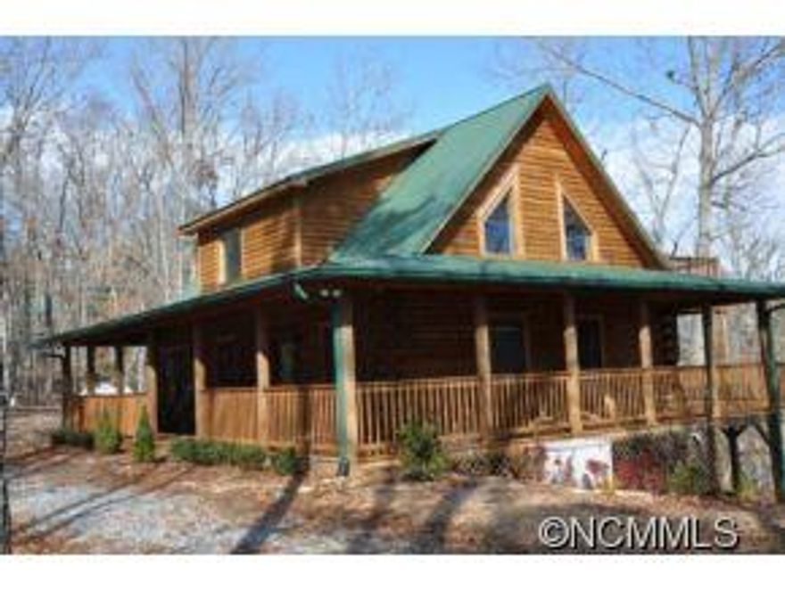 Beautiful 2000+ Sqft Log Cabin-Perfect Mountain Cabin that has it all! This cabin has a Bedroom & Full Bath on all 3 levels. Granite countertops & Top End Appliances in Kitchen with attached Dining Room. Large Open Living Room with Stone Fireplace, Hardwood Floors, full wall of Windows to Enjoy Seasonal Mtn Views. Large Master Bedroom with Sitting Area & Master Bath-Shower & Jetted Tub. Basement level has been completely renovated & has 2 Bedroo