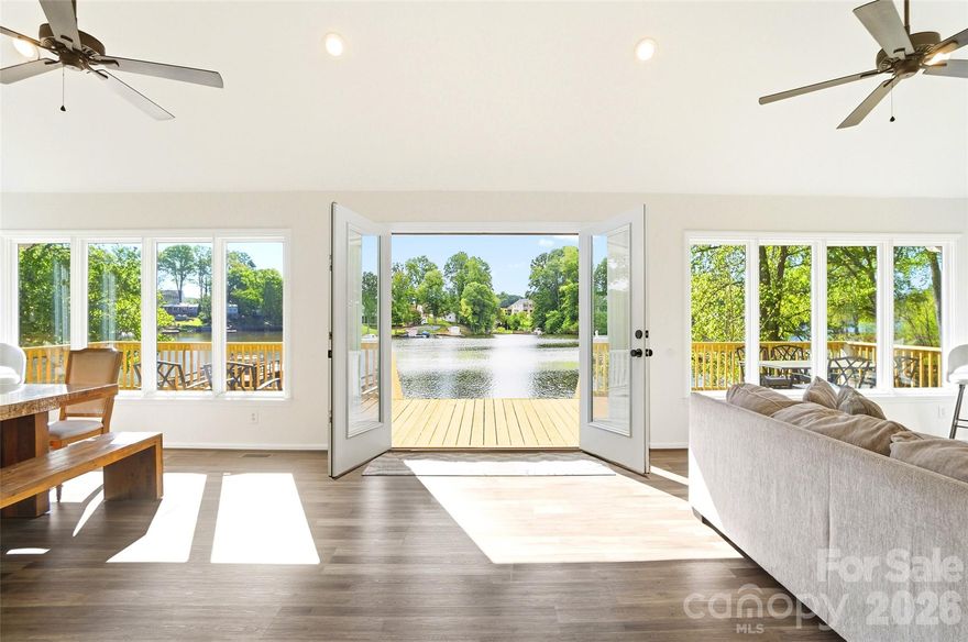 Wake up to breathtaking waterfront views in this beautifully updated 3-bedroom, 2-bath lakefront retreat. Designed for both relaxation and entertaining, the home features soaring cathedral ceilings, an open-concept living area, and a dramatic wall of windows that fills the space with natural light while showcasing the lake from nearly every angle.

Set on nearly an acre, the outdoor space is just as impressive, offering a level beach area, private dock, and expansive deck perfect for sunset views, gatherings, or quiet mornings by the water. Enjoy stunning lake views, a peaceful setting, and the privacy of a secluded drive, all combining to create the ideal escape.

Extensive upgrades include a new roof (2022), all-new plumbing (2022), updated bathrooms (2022), a fully renovated kitchen (2026), a brand-new deck with railings (2026), and fresh interior paint (2026), ensuring a move-in-ready experience with modern comfort throughout.

Currently operating as a successful Airbnb, the home comfortably accommodates 10 guests; offering excellent flexibility as a primary residence, vacation home, or income-producing property.

Please do not disturb guests or approach the property without a confirmed appointment.