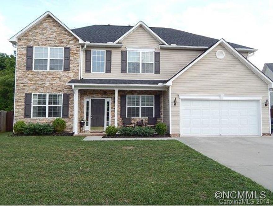 Premium lot in a great neighborhood w/sidewalks, walking trails & mountain views. Located in a cul-de-sac w/privacy fencing that opens up to a large common area and creek. Four bedrooms including a bonus room & office that could offer expansion for a larger family. Open floor plan w/42 inch cabinets, stainless steel appliances and wood laminate flooring throughout the main floor. Close to shopping & convenient to both Asheville & Hendersonville.