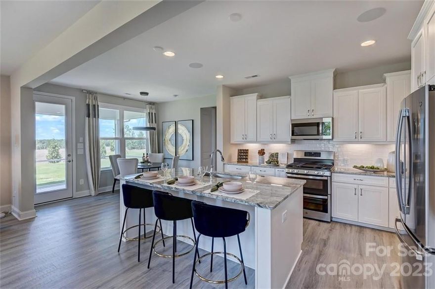 MLS # 4054582 REPRESENTATIVE PHOTOS ADDED. The Essex II is a perfect choice for homeowners who value A+ curb appeal. This home features a welcoming entrance. Usher guests down the hall to the stunning open concept gathering room. A perfectly sized study is located as you walk in the foyer! Love where you cook with a gourmet kitchen with a large food prep island, expansive countertop space, walk-in pantry and additional butler’s pantry. Guests will certainly enjoy their stay with the first-floor guest suite. Upstairs features two secondary bedrooms, a large game room and a truly remarkable owner’s suite. It’s hard to imagine a more complete setup with the tub and shower, dual vanity, and massive walk-in closet. Structural options include: tray ceiling, gourmet kitchen, 4' extension at gathering room with fireplace, additional windows, study, covered outdoor living, and ledge at owner's shower.