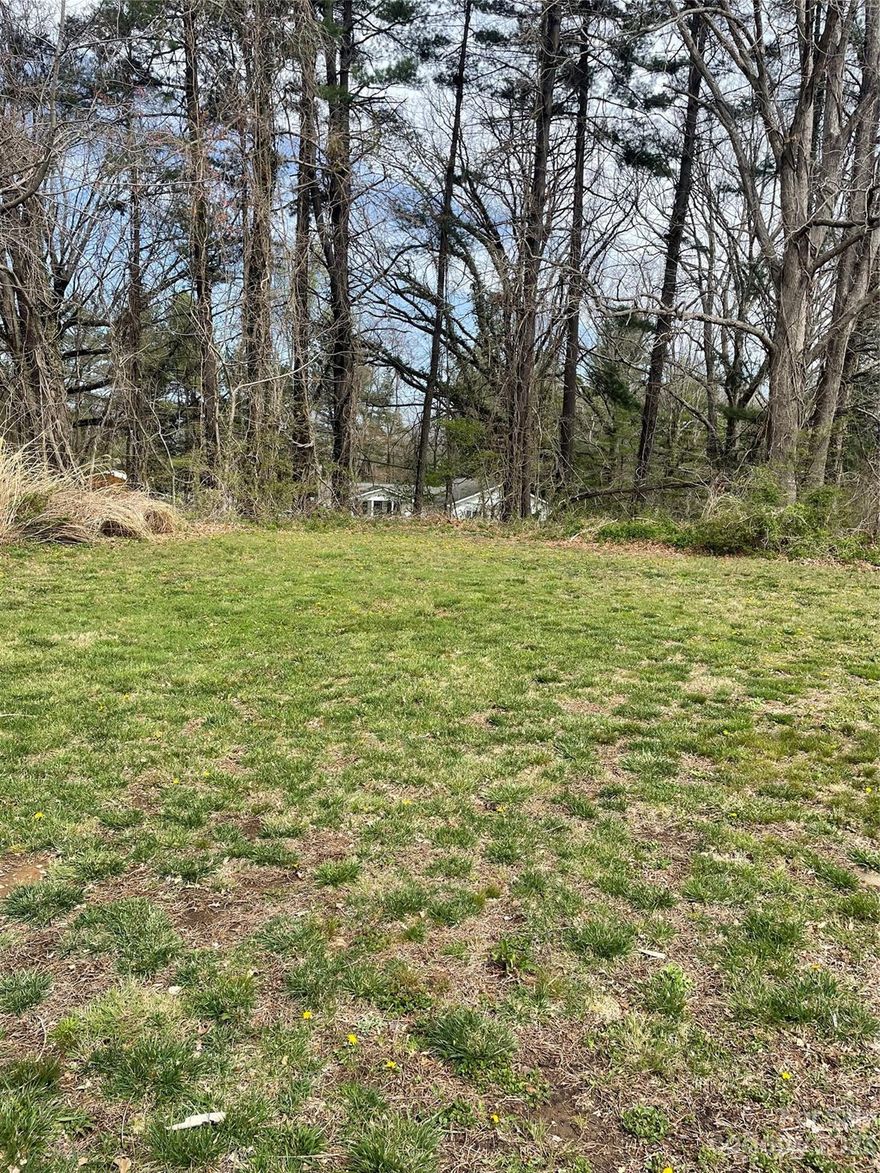 For those looking to build in Asheville. Builders  alert! Fantastic price! Wonderful opportunity to buy and build your home on this wooded corner lot on West Chapel Road.  There are new homes being built all around because this area is convenient to everything with public utilities believed to be available, yet County taxes.This .38 acre lot could be yours but hurry it will not last long.  Multiple offers received Multiple offers received on 99999 West Chapel Road.  Seller is calling for highest and best by Monday April 10th  at 5.Thanks