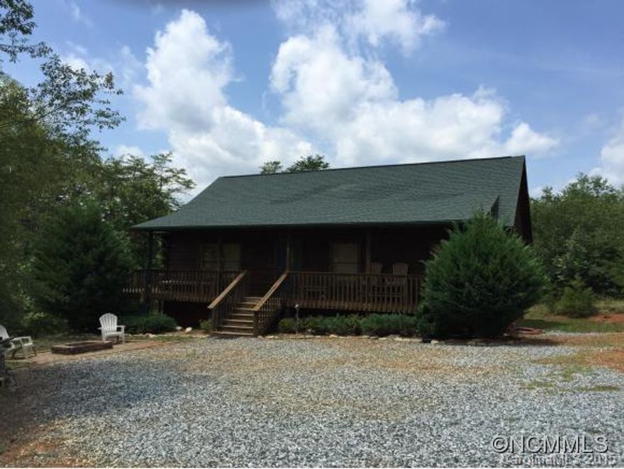 2BD/2BA cabin with covered front porch and side deck to enjoy your private, peaceful country setting within minutes from shopping, hospital, and major highways! Open floor plan with cathedral ceiling in family room and eat-in kitchen with breakfast bar and large pantry! Master bedroom and  master bath with double vanities, tub/shower, and walk-in closet! hall with laundry closet, jack and jill bath/shower only to share with 2nd. bedroom!