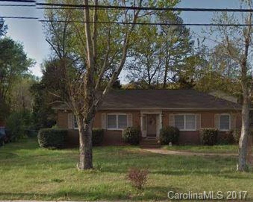 ALL BRICK spacious home. Huge rooms include formal dining, den w/ fireplace, eat in kitchen, & sunroom. Five year old roof.  Large fenced backyard w/ seasonal flowers & shrubbery.  Location across from a school & girl scout building, stores & restaurants within walking distance, nearby boulevards for quick & easy access to freeways & interstate highways.  Home needs bit of repair/improvement, & is being sold ‘AS IS.’  Building in backyard is part of estate but not included in home sales price."