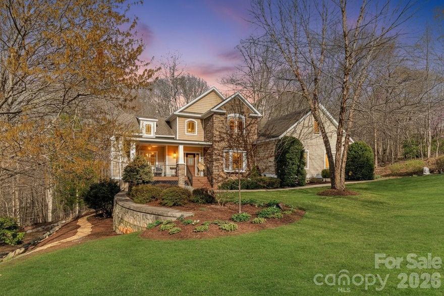 Here is your opportunity to own one of the area’s most private and well-appointed homes in Sherrills Ford. Situated on 2.25 acres in Mountain Creek Ridge, this 4-bedroom, 3 full and 2 half bath home delivers over 4,400 square feet of refined living space surrounded by mature landscaping and peaceful creek frontage.

Inside, the home is both grand and inviting. A dramatic two-story living room anchors the main level, filled with natural light and designed to flow effortlessly into the kitchen and gathering spaces—ideal for everyday living and entertaining alike. The main-level primary suite offers a true retreat, complete with a spa-style bath and oversized shower that feels more like a private resort than a home.

The walk-out lower level is thoughtfully finished to maximize flexibility, featuring a spacious family room, game area, and private guest suite with full bath and amazing theater room. The basement is ready plumbed for a future kitchen, this level is perfectly suited for multigenerational living, extended stays, or elevated entertaining.

Additional features, a versatile FROG/bonus room with half bath, and multiple outdoor living spaces are designed to take full advantage of the natural setting. Enjoy evenings on the deck, unwind in the saltwater hot tub, or gather around the fire feature with the calming sound of water nearby—creating an outdoor experience that feels both elevated and serene.

Conveniently located just minutes from Highway 16, this home offers easy access to Hickory, Mooresville, and Charlotte, while still maintaining a tucked-away, peaceful setting. With Mountain Creek Park less than a mile away and Lake Norman amenities close by, the location perfectly balances privacy and accessibility.
Back on the market—this exceptional property offers a rare second opportunity to experience everything this custom home has to offer.