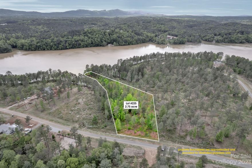 Gorgeous LAKE FRONT property located in desirable "The Waterfront Club"!!  Build your dream home or a vacation home on this private 2.74 acres. Which is sure to become a desirable place to be on Lake Rhodhiss. Beautiful water views on the main channel Enjoy scenic boating, fishing, or water sports. Dine in local eateries and hometown breweries, and convenient access to major highways that can take you to Charlotte or the Blue Ridge mountains in a short hour drive. Annual dues for The WATERFRONT Club include a waterfront pavilion, with a private community dock, lakefront fire pit, clubhouse, and pool. Do not miss out, this property will not last long.