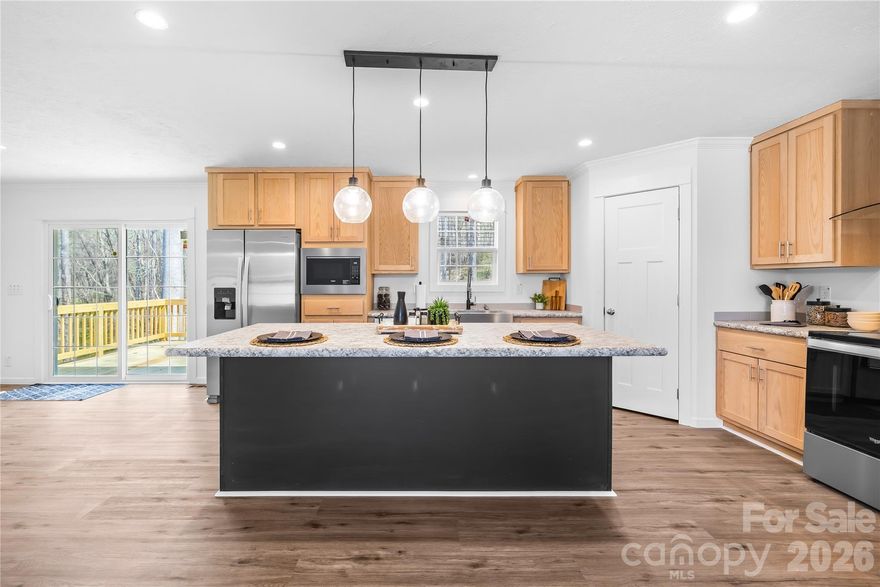 Welcome to the perfect blend of modern comfort and peaceful country living! Situated on a generous 1.01-acre lot in a desirable non-HOA community, this BRAND-NEW manufactured home offers the space, freedom, and upgrades today’s buyers are searching for and comes with a 7-year warranty. Boasting 1,707 heated square feet, this thoughtfully designed home features 3 spacious bedrooms and 2 full bathrooms, all enhanced by high-quality finishes rarely found in manufactured homes. From the moment you step inside, you’ll notice the attention to detail, open-concept layout, and upgraded touches that elevate the entire living experience such as luxury vinyl plank flooring throughout and ceiling fans in every room. The heart of the home offers a seamless flow between the living, dining, and kitchen areas—perfect for entertaining or everyday living. Step outside to the beautiful rear deck, an ideal spot for morning coffee, grilling, or simply enjoying the privacy of your expansive yard. With over an acre of land, there’s plenty of room to create your dream outdoor space—whether that’s a garden, workshop, or additional recreational area—all with the added benefit of no HOA restrictions. If you’ve been searching for a move-in-ready home with modern upgrades, ample space, and the freedom to truly make it your own, this property delivers. Located less than 1 mile from the expanding Villages of Sherrills Ford, all dining and shopping needs are just moments away!