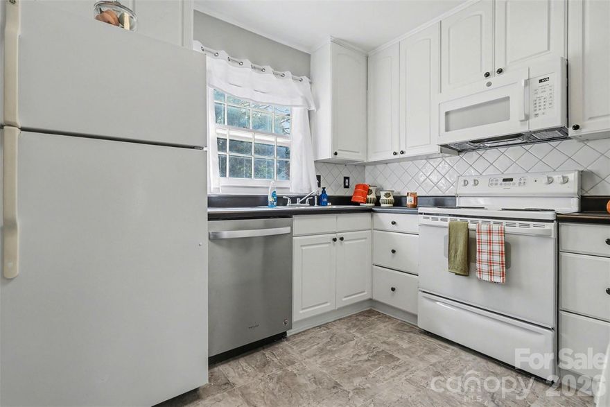 This well-maintained condo offers a bright, functional layout with fresh interior paint and an updated kitchen featuring white cabinetry, tile backsplash, modern hardware, and ample storage. Spacious living and dining areas provide flexibility for everyday living, while neutral finishes throughout make this home truly move-in ready. The HOA covers exterior maintenance and storm-related repairs, and planned improvements include window and roof updates, offering added long-term value and peace of mind for the next owner. Conveniently located near shopping, dining, and major roadways, this property presents an excellent opportunity for first-time buyers or those seeking affordable homeownership in Charlotte.