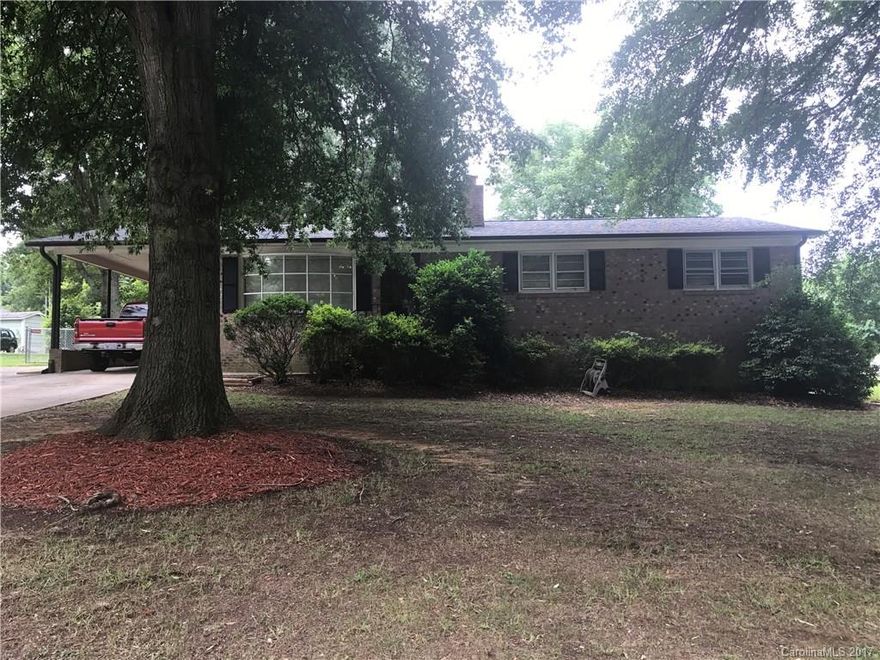 Three Bedroom brick ranch in well established neighborhood.  Home features a large eat in kitchen with new laminate flooring through most of home.  Kitchen has access out to back patio area looking over private back yard.  Newer roof and hot water heater.  Large flat fenced in backyard.  Large workshop with electricity.  Many updates have been done.  A must see!