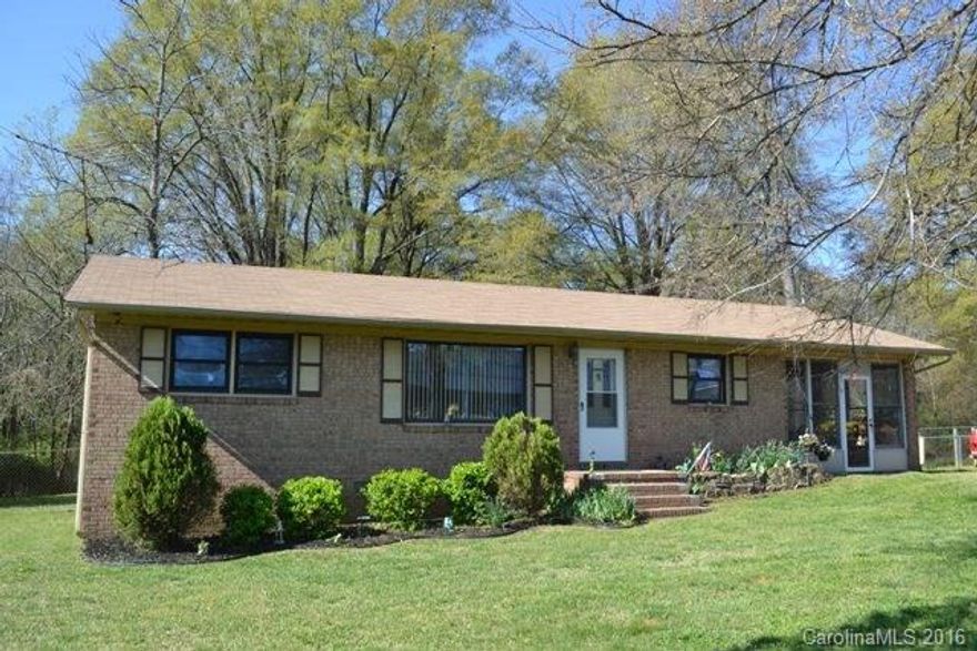 This is an AS IS SALE.  All brick ranch with three bedrooms, 1.5 baths, living room and spacious kitchen and eating area.  Great sun room.  No heating in home except for baseboard heat in the bedrooms.   New roof in 2014, freshly painted in 2015.  Sits on half acres lot.  Hardwood floors under the carpet in two bedrooms. Above ground pool has a 2 year old liner.