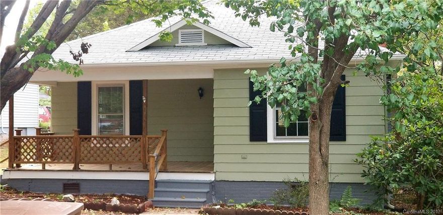 Move in ready 3 bedroom 1 bath home for only $90k!!!  Beautiful front porch and back deck, spacious rooms and high ceilings.  House and building being sold as is.