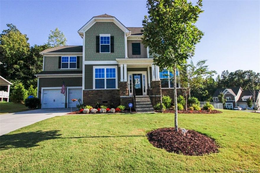 Must see! Situated in the best section of super-hot Lawson subdivision w/ flanking cul de sacs, larger lots, green space and easy access to the walking trails. 1/3 acre fenced lot. Custom built-ins, moldings and stone fireplace make the open living area feel like a custom home. Hardwoods throughout the main w/gourmet kitchen, large center island, granite counters and custom painted cabinets. You'll love the floor plan and family spaces upstairs. Home shows like a model - don't miss it!