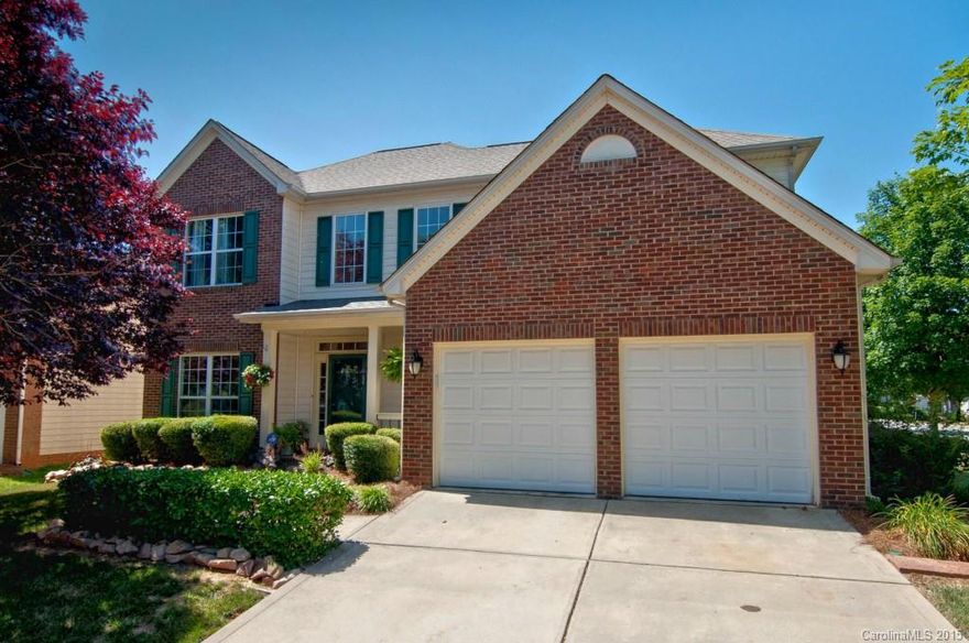 A must-see in desirable and convenient lake front community! With only one original owner, this 2-story home boasts many upgrades including: hardwoods, tile floors, granite counter tops with copper sink, new carpet and fresh paint.  With a nicely landscaped corner lot, this home definitely has great curb appeal.  The Winslow Bay Community features a park with walking trails that lead to the community playground/tennis courts.  The Pool/Clubhouse overlooks the lake and boat access.