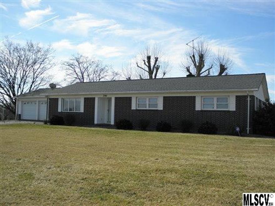 This one owner home was built and upgraded over the years to maintain it in the very best of condition and design.  The owner was a superb handyman that took great pride in his work.  You will be pleased.  The all brick, 3 bedroom 2 bath home has a new architectural shingle roof and a new two car garage replacing a carport.  Trane heating and air ensure comfort in the home, and there is also a large brick gas log fireplace in the den and a wood stove in the basement.  The large basement is divided into three sections.  In the middle there is a finished den and a “real” bomb shelter (could be wine cellar); on one end a superb workshop area, and on the other end a smaller area for storage, and a washer and dryer hookup with access outside.  There are three detached buildings: 45’x48’ with a high roof built to store a motor home, tractor and other items and another 24’x30’ building attached and a smaller building behind and a 26’x28’ building.  The pasture area is fenced in.