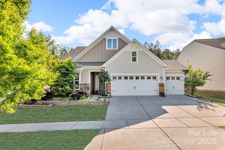 This beautifully maintained 3BR/2.5BA home in the gated and vibrant 55+ community of Tree Tops offers more than just a place to live—it’s about living well every day. From the moment you step inside, you’ll feel the comfort of thoughtful design: open living areas with natural light, and a kitchen that invites connection—complete with granite counters, stainless appliances, and a generous island for gathering. A versatile flex room adapts to your life: formal dining, home office, guest space, or creative studio. The spacious primary suite features a quiet sitting area that opens to a 4-season porch—ideal for morning coffee or evening wind-downs. Out back, the professionally landscaped yard and expanded paver patio create an ideal setting for entertaining or relaxing in peace. And when you're ready to explore, Tree Tops has it all—from fishing on the 10-acre lake to the clubhouse, pool, dog park, and amphitheater. This isn’t just a home—it’s your next chapter, beautifully written.