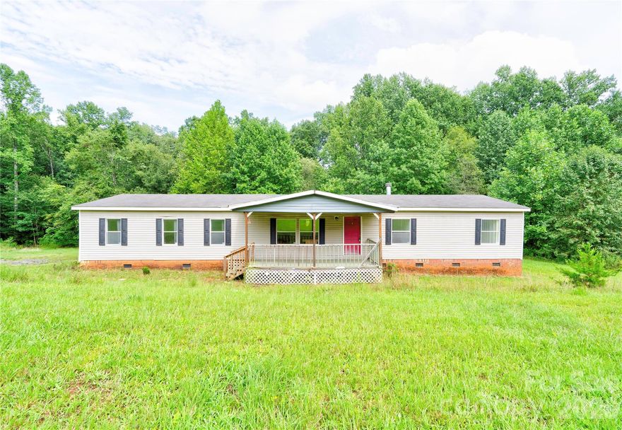 4 Bedroom, 2 Bath home tucked away at the end of a residential street on 2.2 private acres. This spacious property offers the perfect balance of comfort and seclusion, featuring a peaceful creek running through the land. The home includes a large primary suite with a walk-in closet and double vanity, two separate living/family rooms, and three additional bedrooms with a second full bath providing ample space for everyday living and entertaining. All appliances convey, including refrigerator, washer, and dryer. Buyer agents welcome!