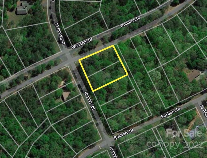 Come build your perfect Lake Tillery retreat! These two lots are being sold together and filled with beautiful trees that will provide a private and peaceful feeling to your home! Current 2 bedroom septic permit on file! The gated community of Woodrun provides so many amazing amenities such as a community boat ramp, clubhouse, pool and playground overlooking the lake, tennis courts and more!