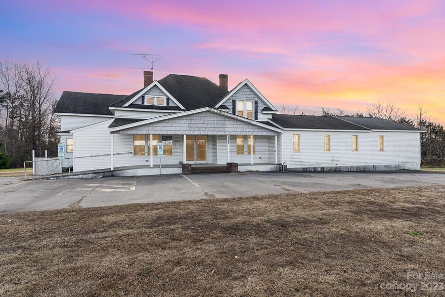 Welcome to East Bend, NC's exceptional opportunity! This multi-zoned 1.5+ acre property offers a 50x30 detached 2-car garage, The main level features 1 full & 3 half baths, dining, kitchen, living room,with wood burning fireplace and a proposed main level bedroom, Upstairs ceiling height under 7 feet and not included in sq ft but prior owners used as 3 bedrooms. East Bend, with its community spirit, sets the stage for diverse possibilities. This property, a versatile canvas, invites you to shape it into your dream residence or small business venture. Sold as is, will need repairs. See agent only. DOT has informed the seller that there are plans to "modernize roadway and intersection improvements on NC 67 from US 601 in Boonville to West Main St in East Bend" which could possibly impact the property in some way