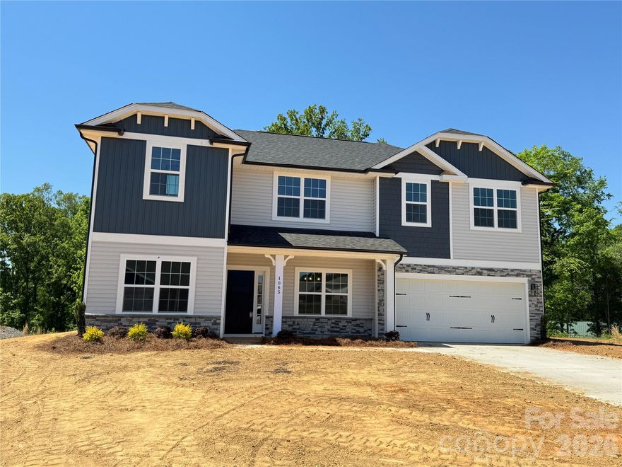 The highly sought-after 2721 Plan offers the perfect blend of space, style, and functionality in this beautiful 4-bedroom, 3.5-bath new construction home located in desirable Kerns Ridge.

Step onto the welcoming covered front porch and into a bright foyer flanked by a formal dining room and versatile formal living room—perfect for a home office, sitting room, or flex space. The thoughtfully designed floor plan offers multiple living areas, including a spacious family room ideal for relaxing or entertaining.

The galley-style kitchen is a standout feature, showcasing stainless steel appliances, granite countertops, soft-close cabinetry, a ceramic tile backsplash, and a granite peninsula that opens seamlessly to the breakfast area, complete with a convenient drop zone trim package.

Upstairs, you’ll find the primary suite along with three additional guest bedrooms, a generous loft area, and a dedicated laundry room. One guest bedroom even features its own private full bath, perfect for visitors or multi-generational living.

Whether you’re enjoying a cozy evening by the fireplace, entertaining guests on the covered lanai, or sipping your morning coffee on the front porch, this home offers comfort and flexibility for every lifestyle.

With 2,721 square feet of well-designed living space, this home truly has it all—don’t miss your opportunity to make it yours!