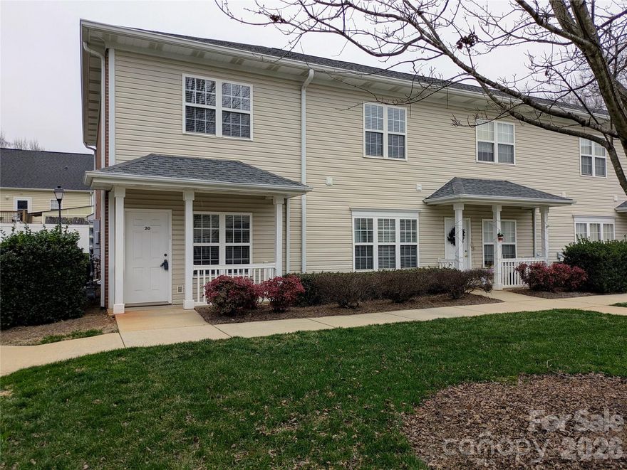REDUCED $10,000.  Don't miss out on this 2 bedroom, 2.5 bathroom end unit home in Davidson, just a short walk to Beaty Park and Davidson College. The home offers a functional floorplan and a covered front porch that welcomes you in. The main level features durable vinyl plank flooring and a gas fireplace in the living room for cozy evenings. Upstairs you will find two primary bedrooms, each with its own private full bathroom for added privacy and convenience. The stove, refrigerator, dishwasher, washer, and dryer are included.  HVAC is dated 2018.  Per HOA roof on the building was replaced in 2013.