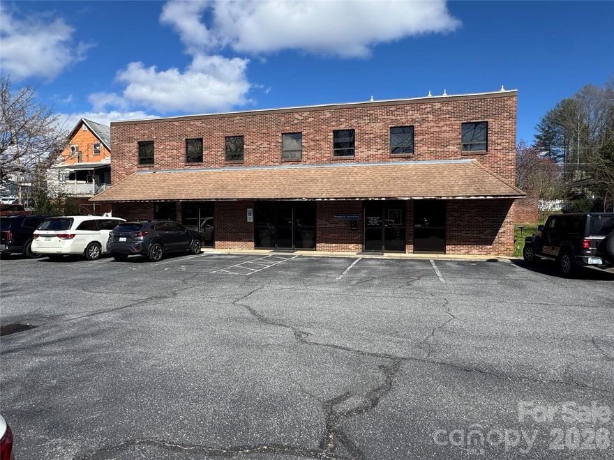 MEDICAL OFFICE FOR SALE IN PRIME LOCATION OF DOWNTOWN LENOIR. A great opportunity to own an office that is affordable and within walking distance to Caldwell Memorial Hospital and other medical facilities. The office is part of a condominium style building with 2 other dental businesses. The facility offers a reception area, waiting room area, up to 6 offices or patient rooms, with 1 office that has a private bathroom & separate entrance, a break room & a bathroom for patients & staff. The unit is in good condition and move-in ready, with the exception of new owners adding their own individual aesthetics. Walking distance to restaurants, shopping, schools & community events.